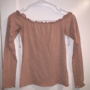 Pink off-the-shoulder shirt